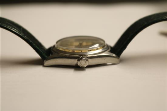 A gentlemans stainless steel mid-size Tudor Oyster wrist watch, on associated strap.